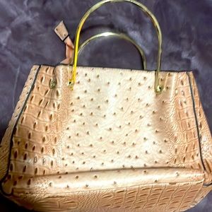 Woman’s evening gold handle clutch